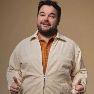 Photograph of festival host Lloyd Griffith